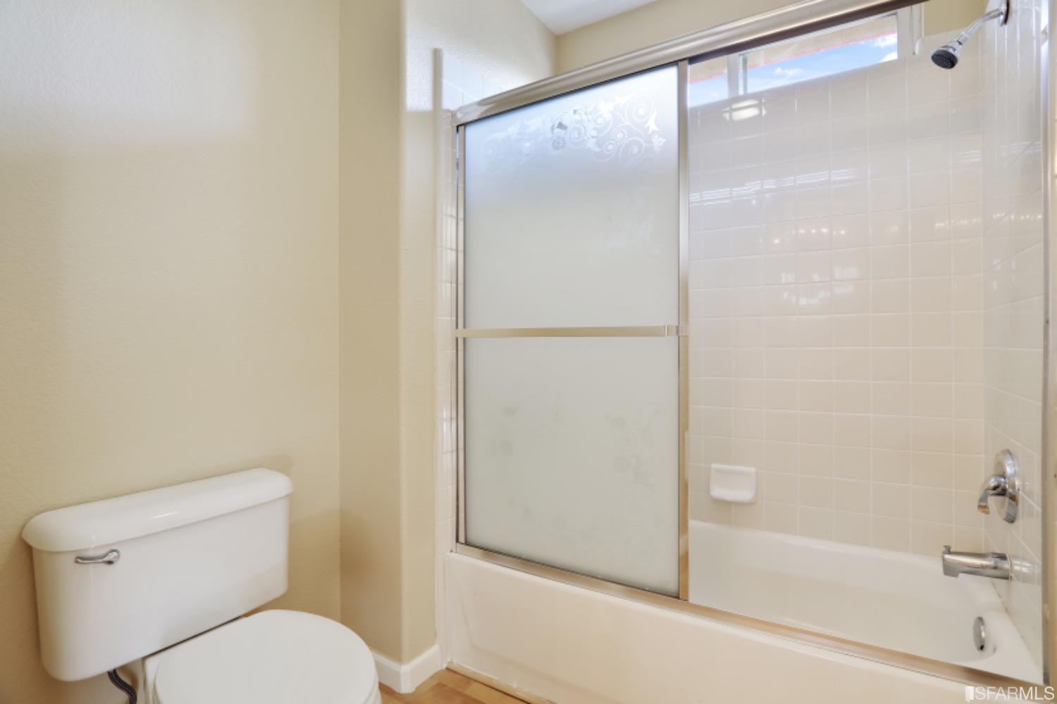 3444 Keystone Loop Discovery Bay, CA 94505 - Photo 25 of 40 a white toilet sitting next to a bath tub