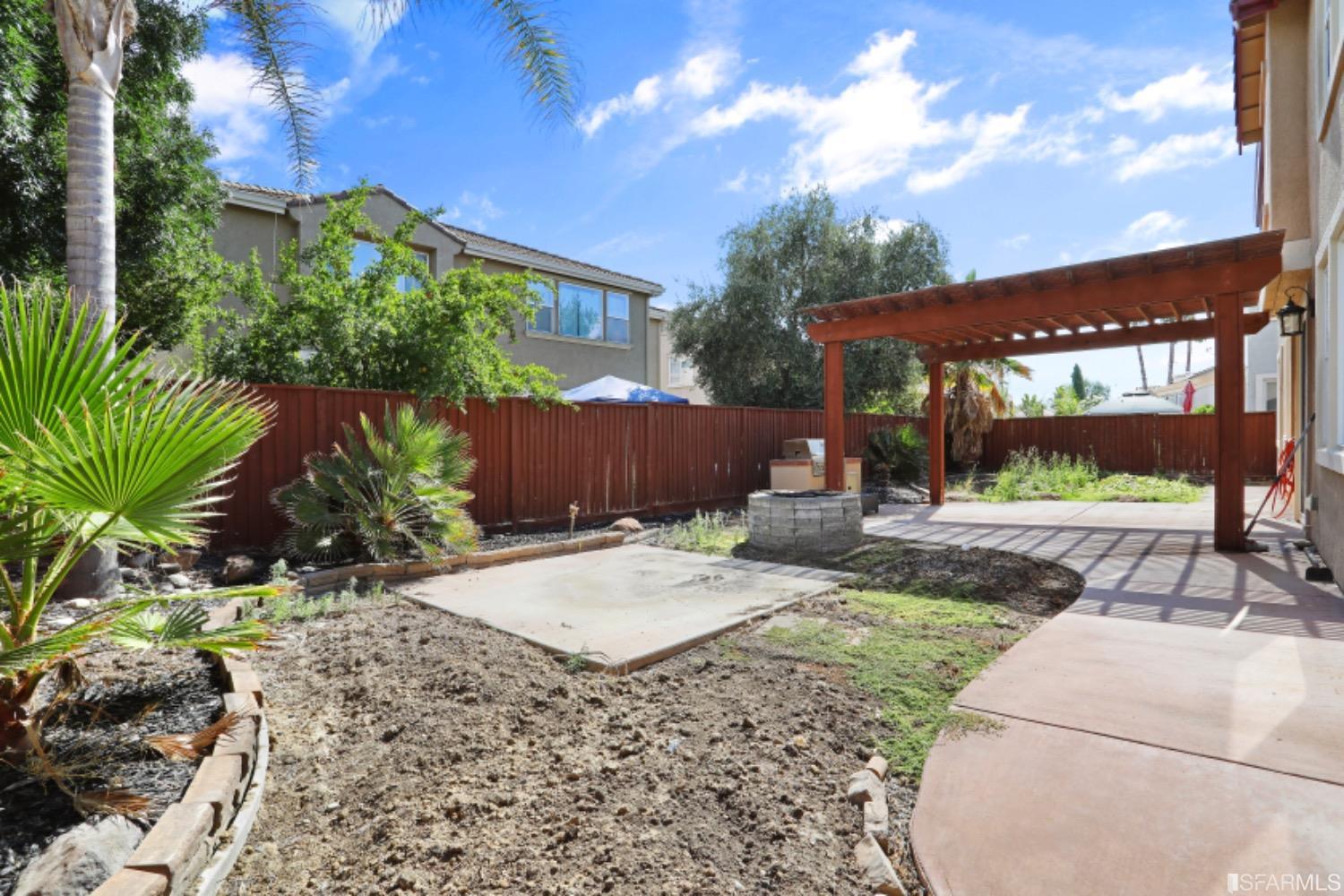 3444 Keystone Loop Discovery Bay, CA 94505 - Photo 33 of 40 a view of a backyard with a garden and plants