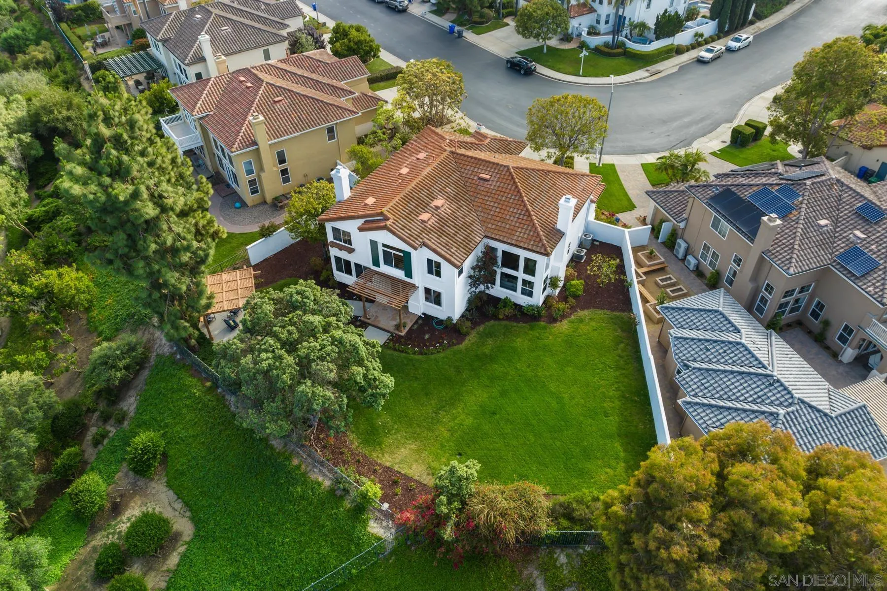 an aerial view of a house with a garden