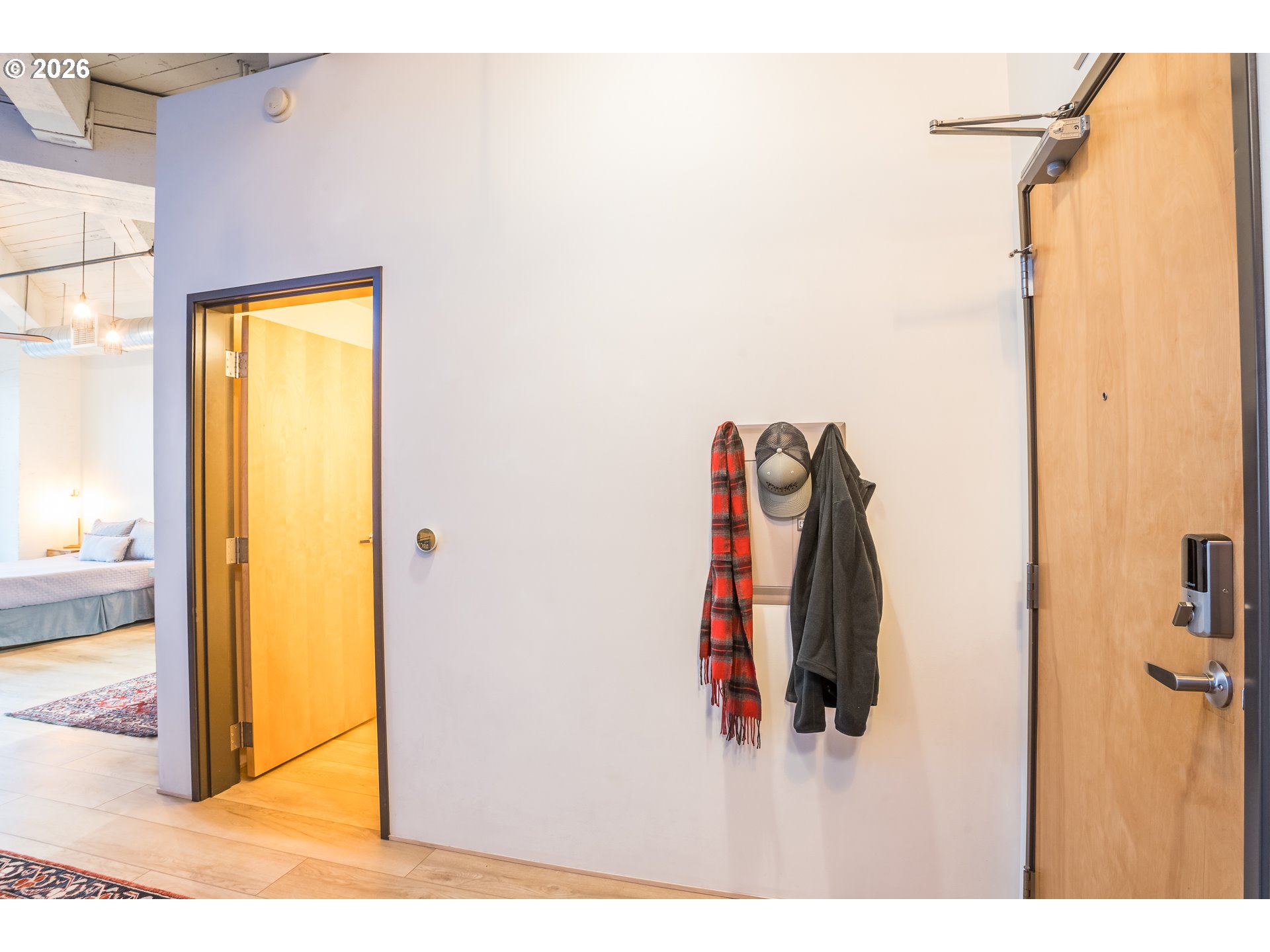 1420 Northwest Lovejoy Street, Unit 417 Portland, OR 97209 - Photo 11 of 40 a view of walk in closet with clothes and shoes