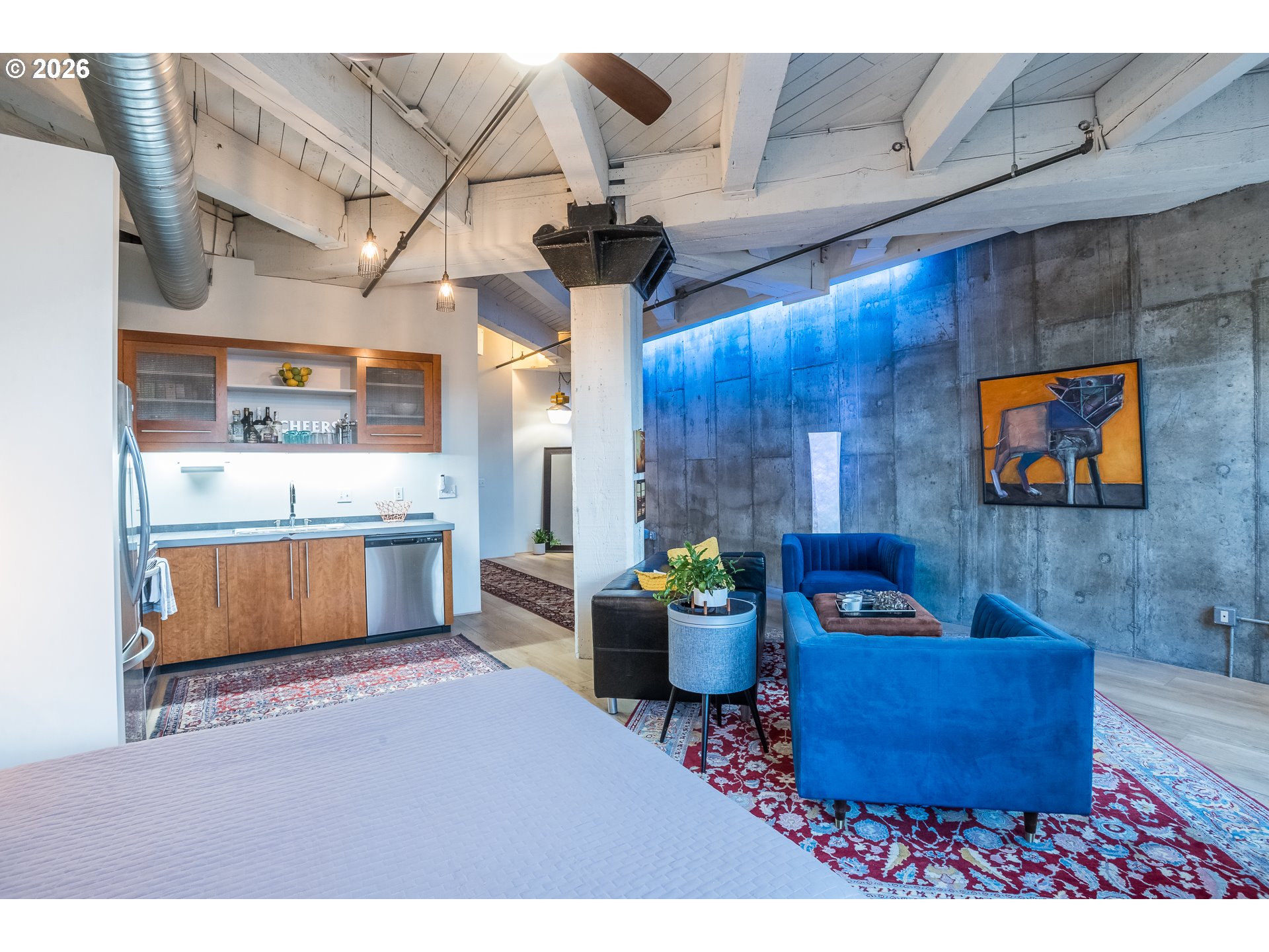 1420 Northwest Lovejoy Street, Unit 417 Portland, OR 97209 - Photo 20 of 40 a living room with furniture and a kitchen