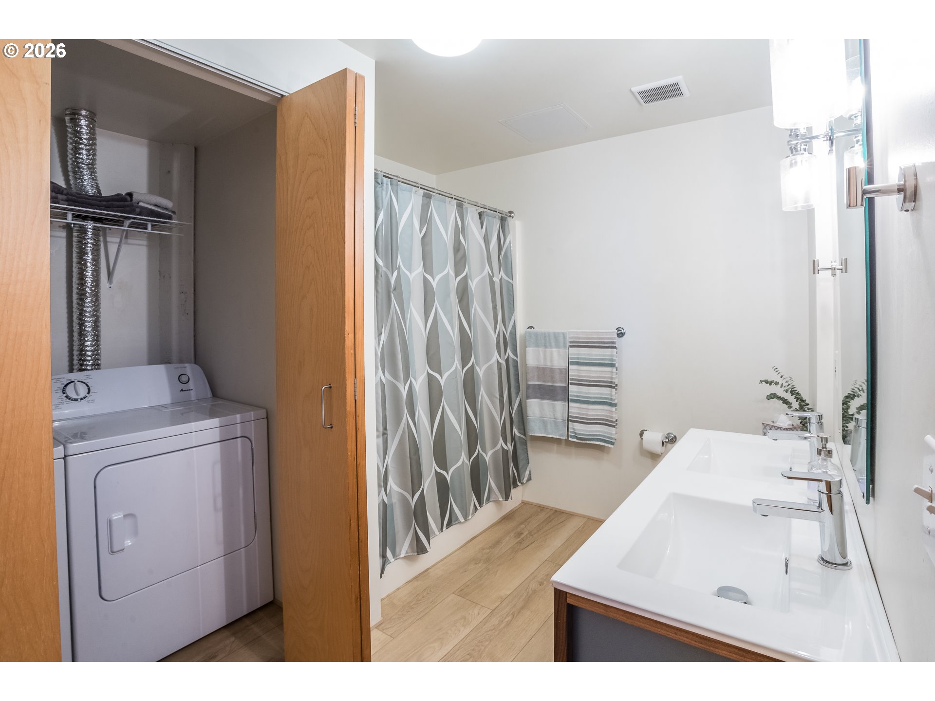1420 Northwest Lovejoy Street, Unit 417 Portland, OR 97209 - Photo 30 of 40 a bathroom with a sink toilet and shower