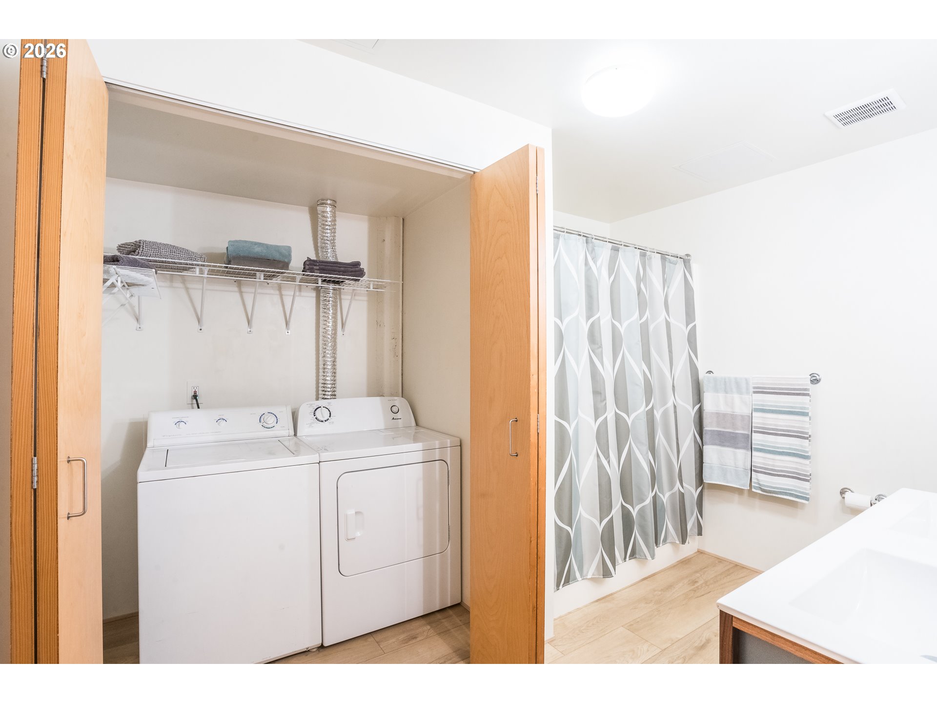 1420 Northwest Lovejoy Street, Unit 417 Portland, OR 97209 - Photo 32 of 40 a utility room with dryer and washer