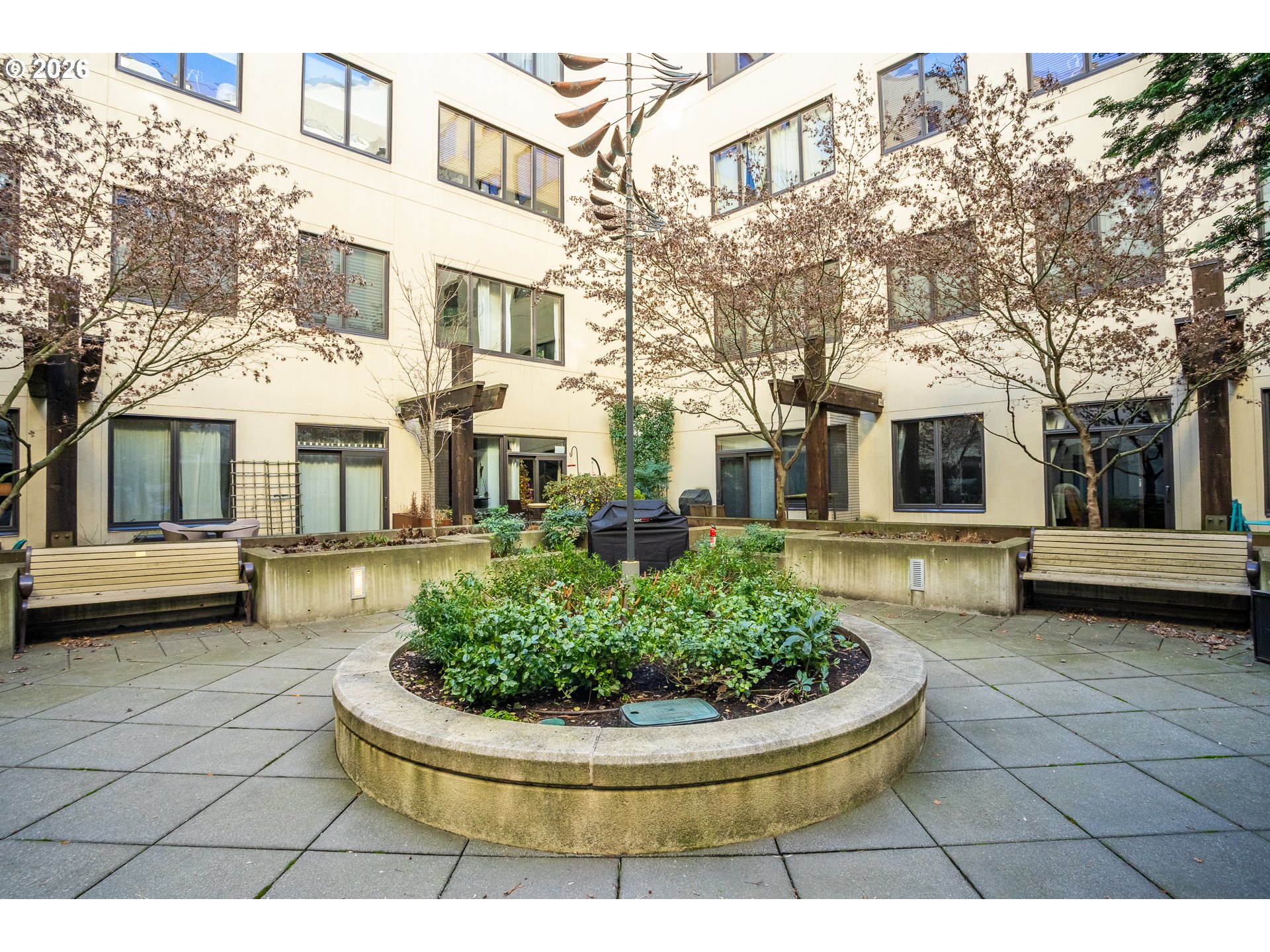 1420 Northwest Lovejoy Street, Unit 417 Portland, OR 97209 - Photo 37 of 40 a view of a white building among the street