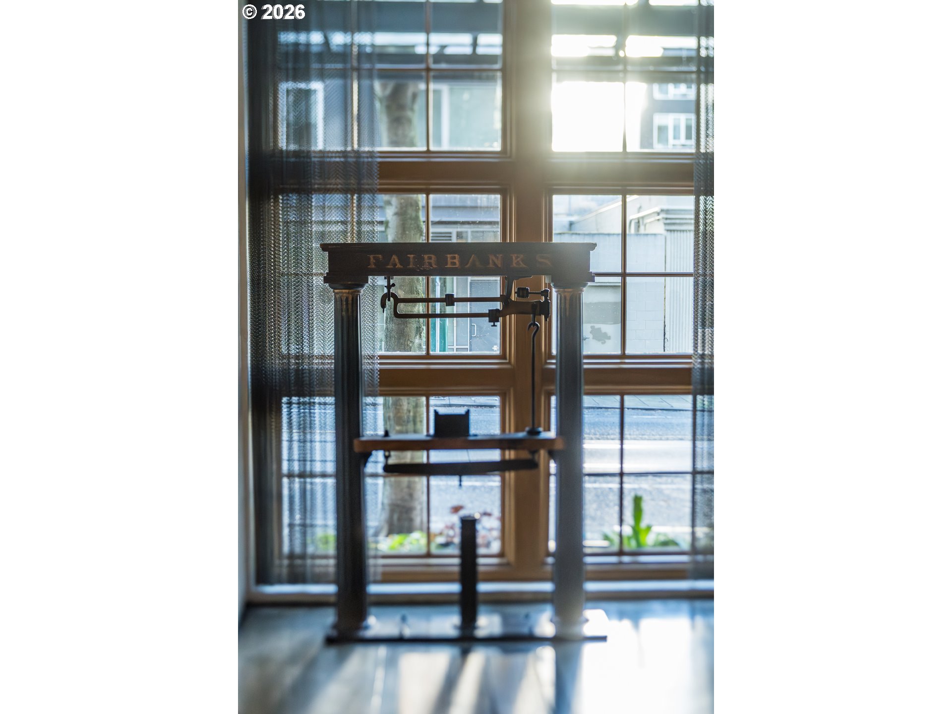 1420 Northwest Lovejoy Street, Unit 417 Portland, OR 97209 - Photo 7 of 40 a picture of a bench in front of building