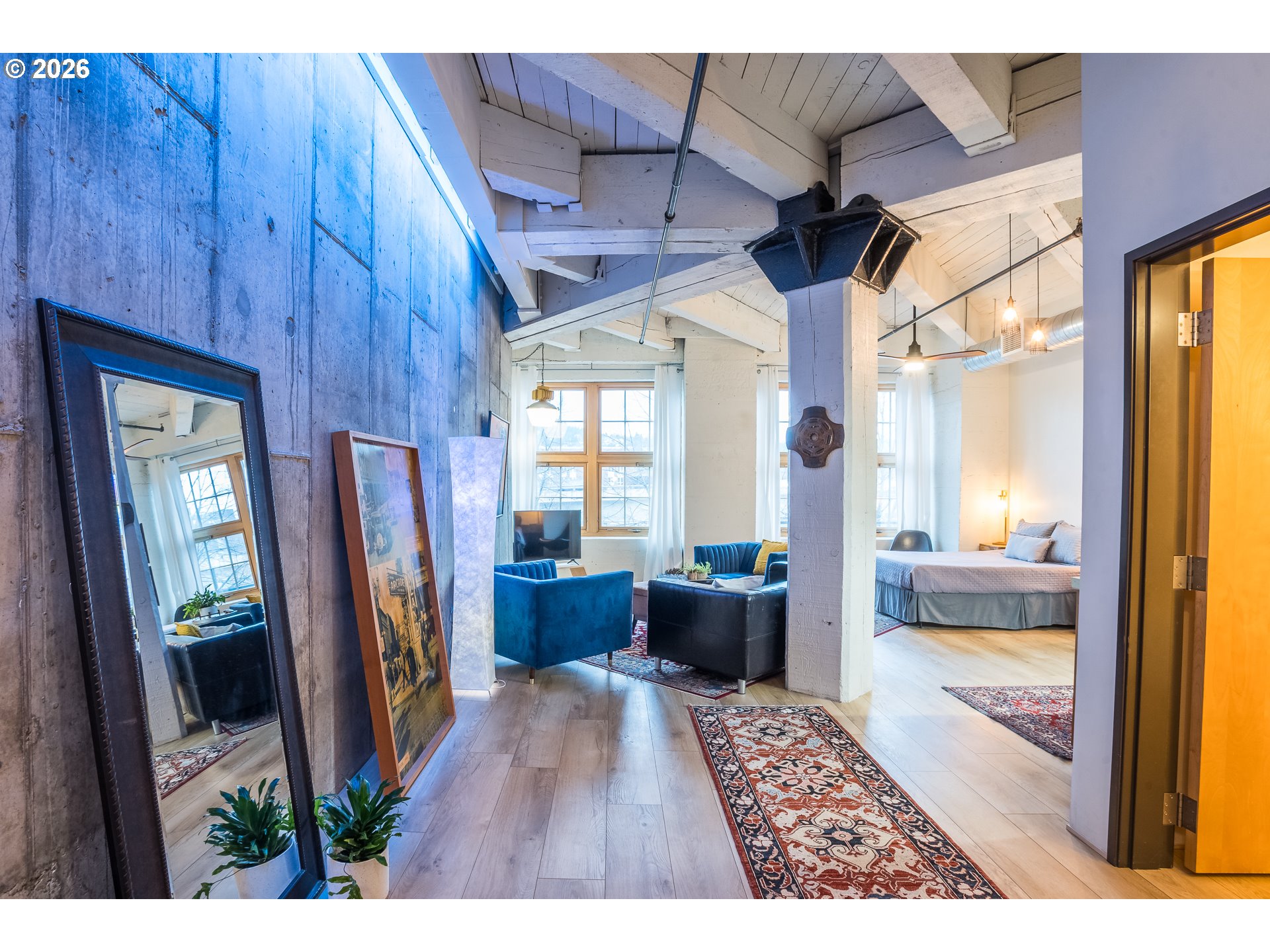 1420 Northwest Lovejoy Street, Unit 417 Portland, OR 97209 - Photo 9 of 40 a view of entryway with furniture and wooden floor