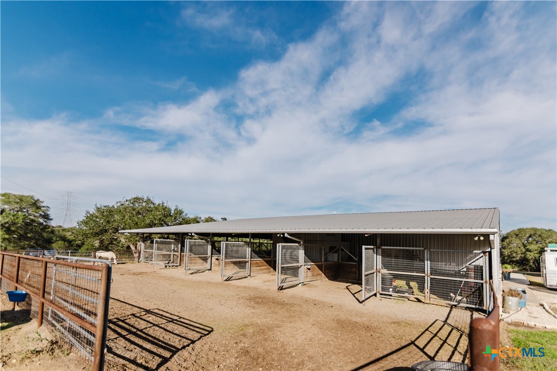 1440 Old Goliad Road Cuero, TX 77954 - Photo 32 of 41 an outdoor view of house with yard