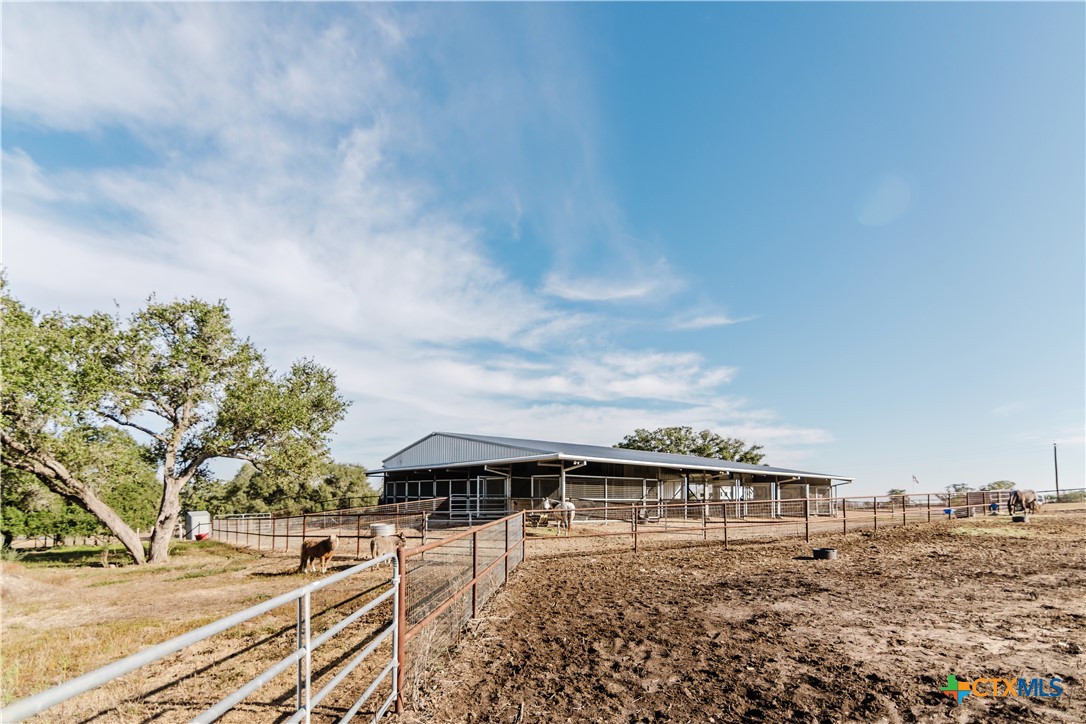 1440 Old Goliad Road Cuero, TX 77954 - Photo 35 of 41 a view of a house with a yard