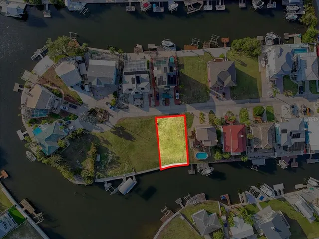 an aerial view of a house with outdoor space