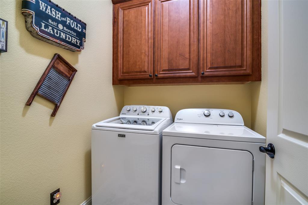 1036 Glenn Road Lavon, TX 75166 - Photo 22 of 30 a utility room with dryer and washer