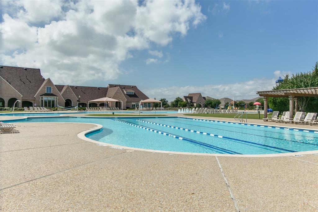 1036 Glenn Road Lavon, TX 75166 - Photo 27 of 30 a view of a swimming pool is in the middle of the house