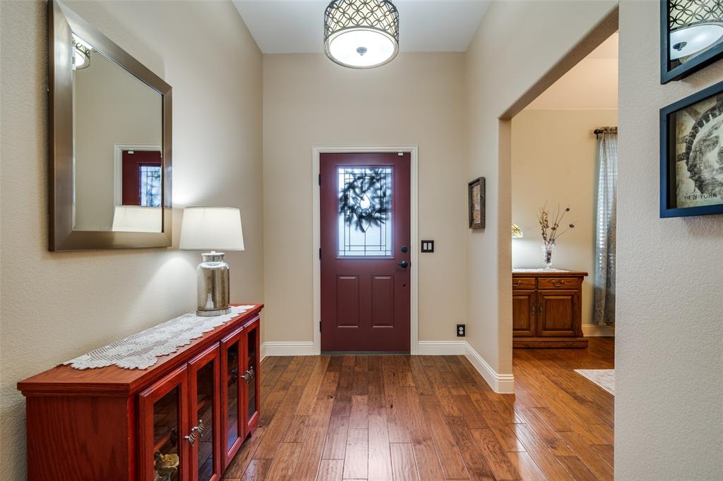 1036 Glenn Road Lavon, TX 75166 - Photo 3 of 30 a view of hallway with furniture and wooden floor