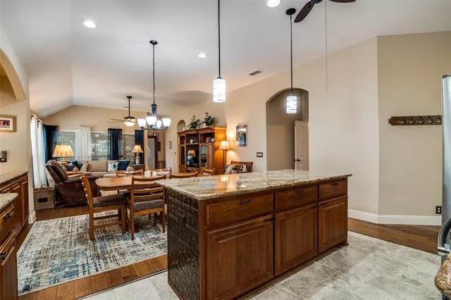a view of a kitchen and dining room
