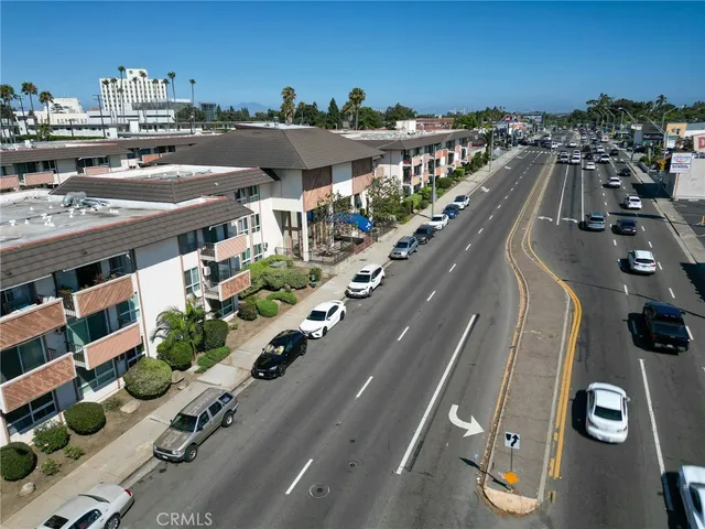 a view of a street and cars
