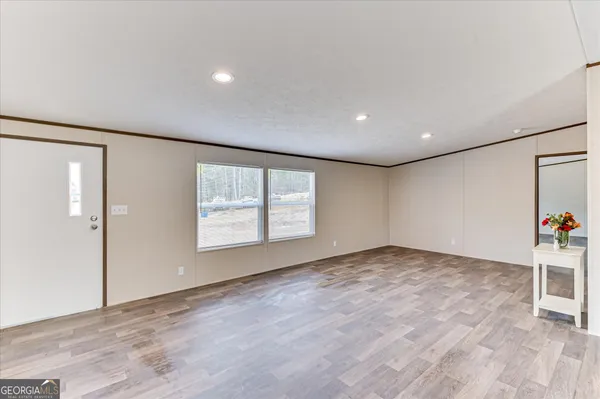 an empty room with windows
