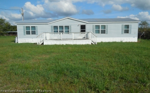 9700 Luther Beck Road Hastings, FL 32145 - Photo 1 of 20 a front view of house with yard and green space