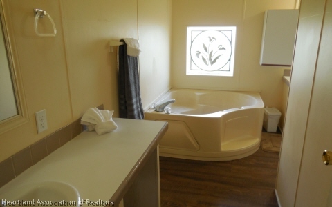 9700 Luther Beck Road Hastings, FL 32145 - Photo 12 of 20 a bathroom with a tub