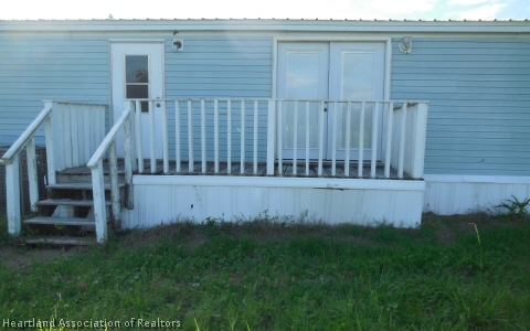 9700 Luther Beck Road Hastings, FL 32145 - Photo 16 of 20 a view of a backyard with wooden fence