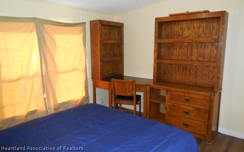 9700 Luther Beck Road Hastings, FL 32145 - Photo 5 of 20 a bedroom with a bed and a window