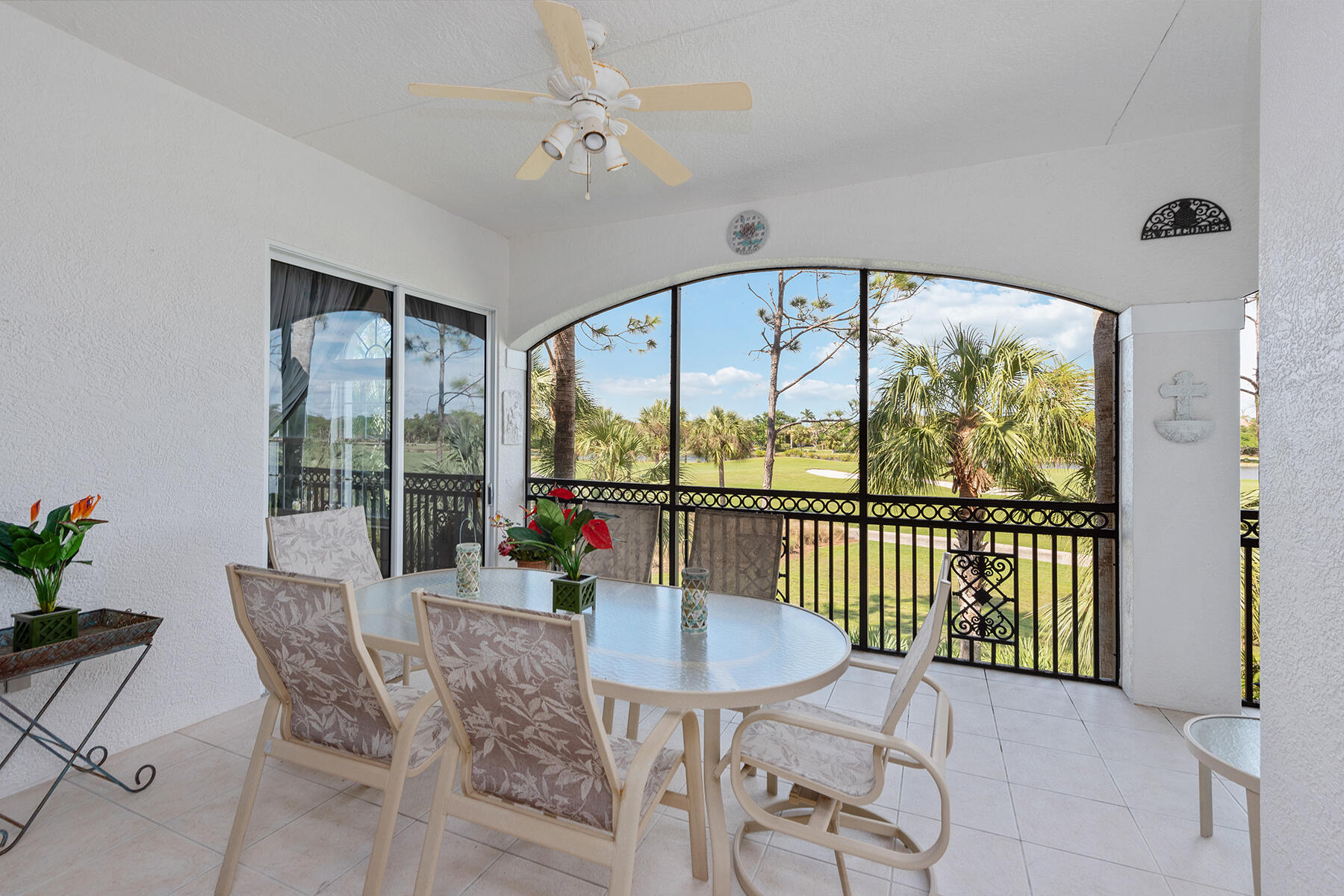 9082 Cascada Way, Unit 202 Naples, FL 34114 - Photo 22 of 37 a view of a dining room with furniture window and outside view
