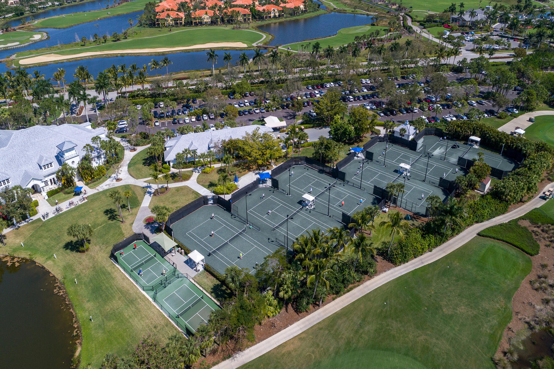 9082 Cascada Way, Unit 202 Naples, FL 34114 - Photo 32 of 37 an aerial view of a house with a garden