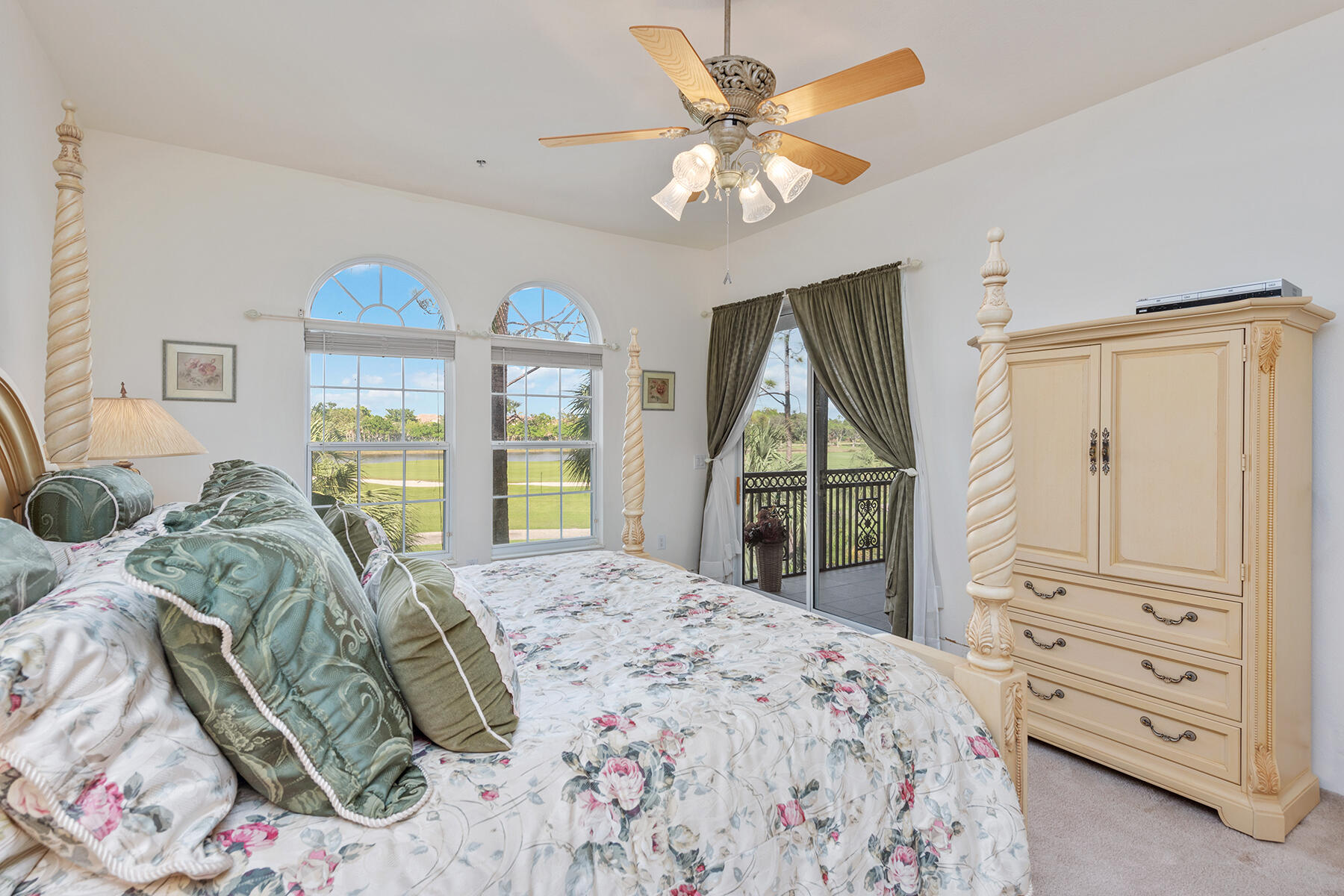 9082 Cascada Way, Unit 202 Naples, FL 34114 - Photo 6 of 37 a bedroom with a large bed and a window