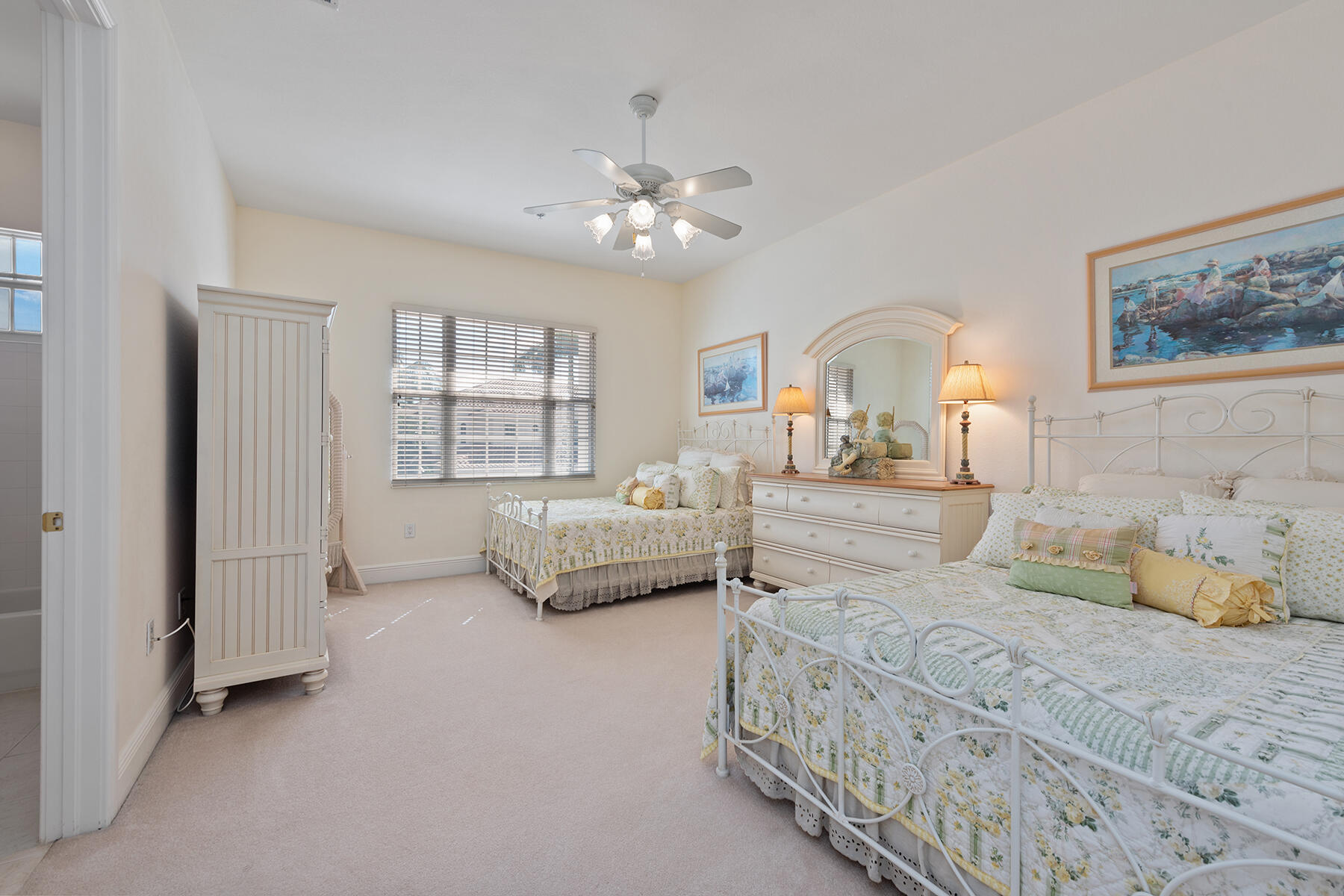 9082 Cascada Way, Unit 202 Naples, FL 34114 - Photo 9 of 37 a bedroom with double bed and a window