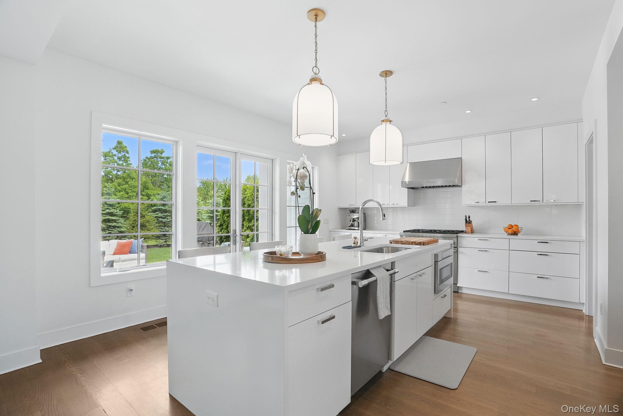 27 Lavender Lane Rye Brook, NY 10573 - Photo 12 of 33 a kitchen that has a lot of cabinets in it