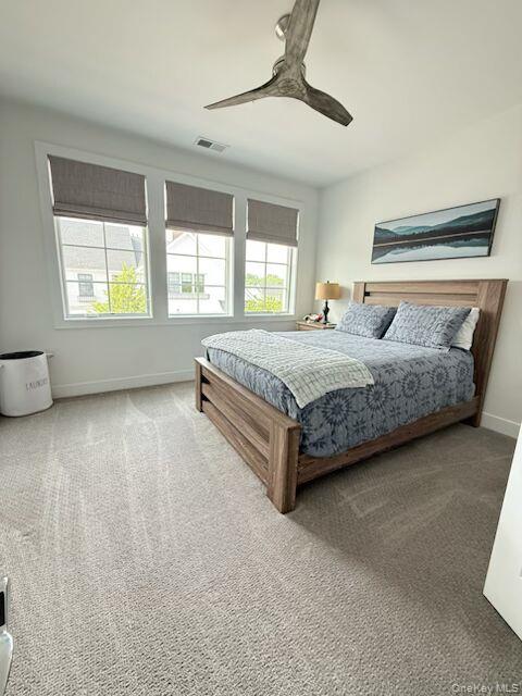 27 Lavender Lane Rye Brook, NY 10573 - Photo 20 of 33 a spacious bedroom with a bed and window