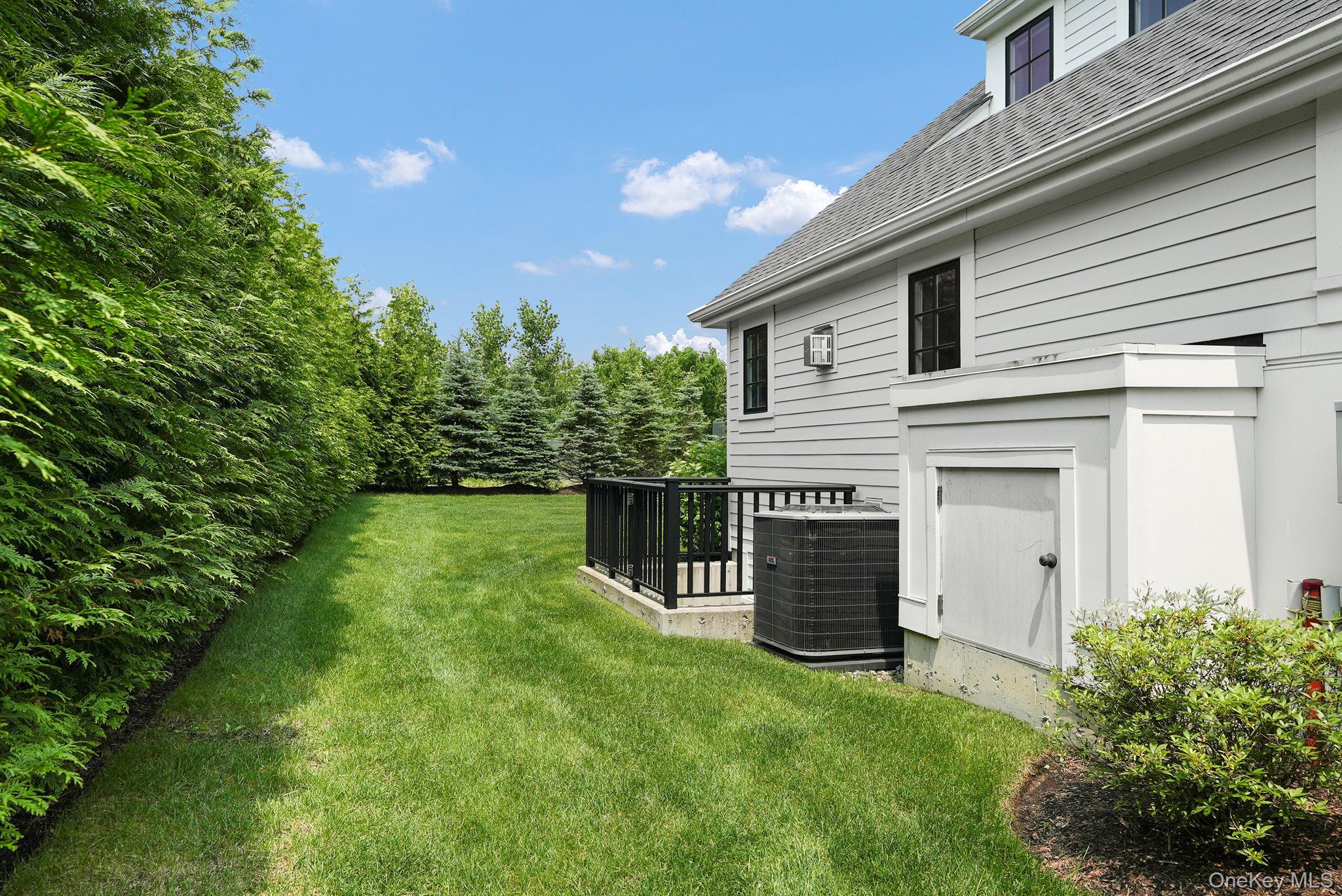 27 Lavender Lane Rye Brook, NY 10573 - Photo 23 of 33 a view of a house with a backyard