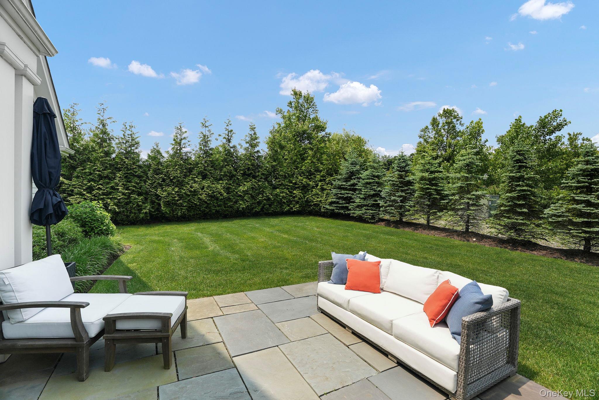27 Lavender Lane Rye Brook, NY 10573 - Photo 25 of 33 a view of yard with seating area and green space