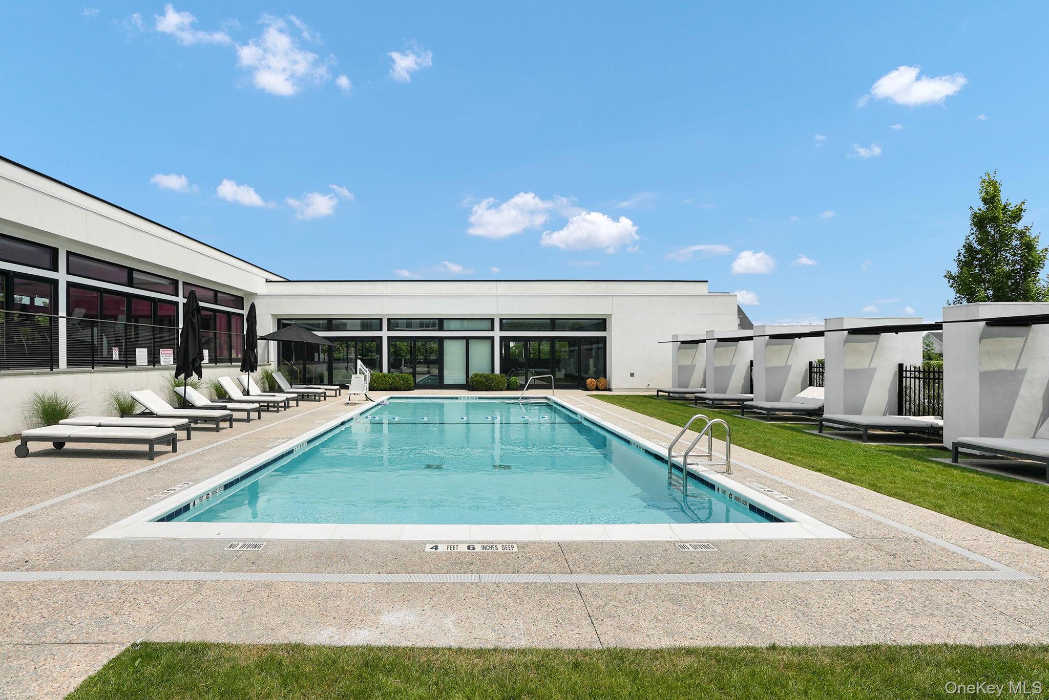 27 Lavender Lane Rye Brook, NY 10573 - Photo 30 of 33 a view of a house with swimming pool and sitting area
