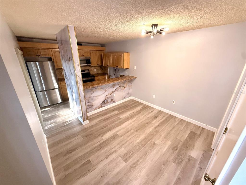 2727 14th Court Palm Harbor, FL 34684 - Photo 11 of 42 a view of a livingroom with a furniture