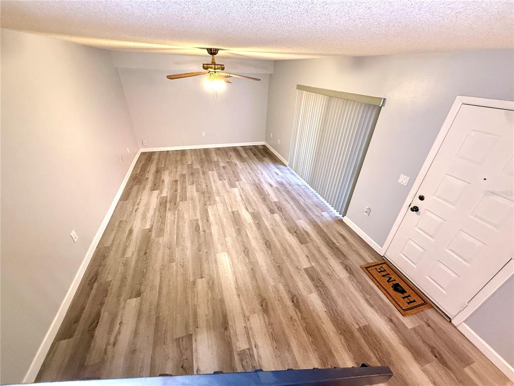 2727 14th Court Palm Harbor, FL 34684 - Photo 17 of 42 wooden floor in a room