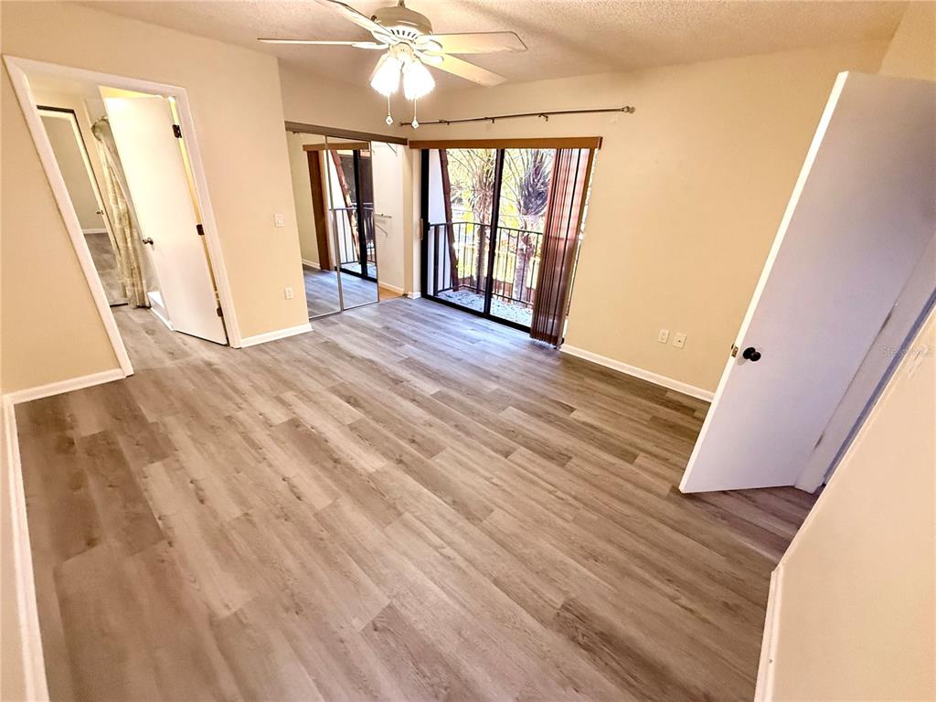 2727 14th Court Palm Harbor, FL 34684 - Photo 27 of 42 a view of an entryway with wooden floor