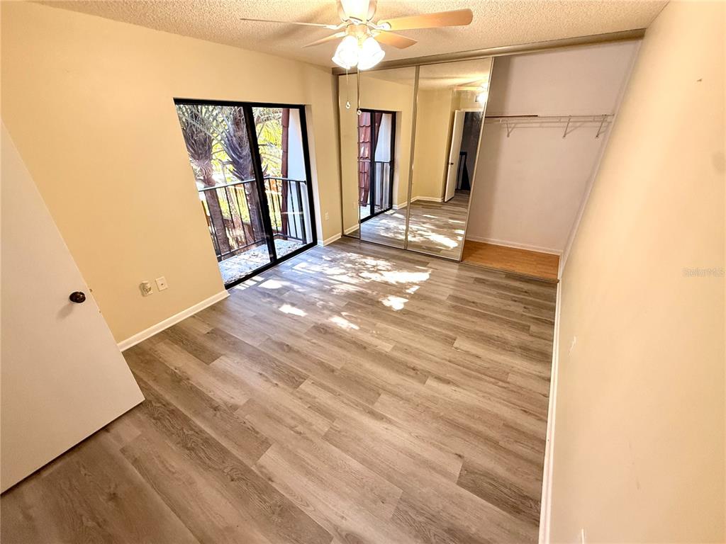 2727 14th Court Palm Harbor, FL 34684 - Photo 36 of 42 a view of entryway with wooden floor