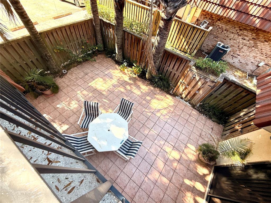 2727 14th Court Palm Harbor, FL 34684 - Photo 40 of 42 a view of an outdoor sitting area with wooden fence