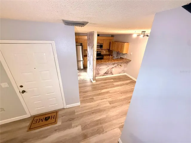 a view of a living room with a sink