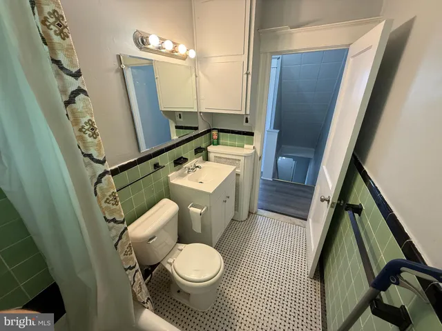 a view of a hallway with staircase