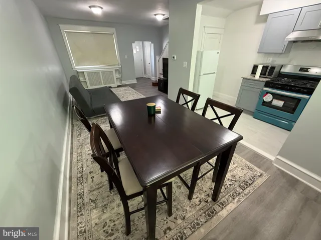 a view of a dining room with furniture