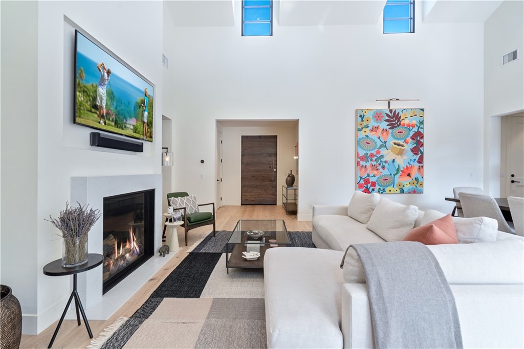 163 Broadway Costa Mesa, CA 92627 - Photo 2 of 56 Enter and enjoy large windows that bring in plentiful light.