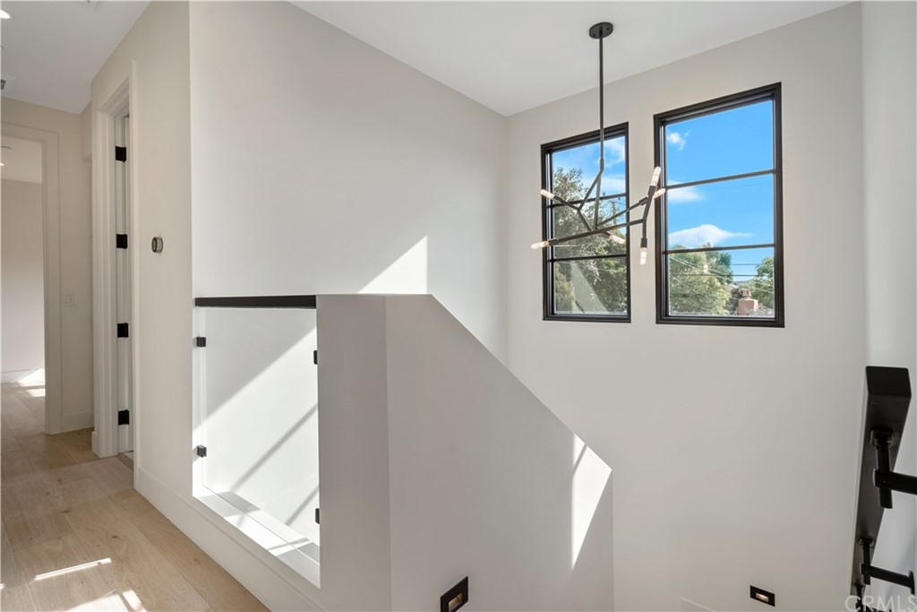 163 Broadway Costa Mesa, CA 92627 - Photo 42 of 56 Upstairs windows bring in ample light.