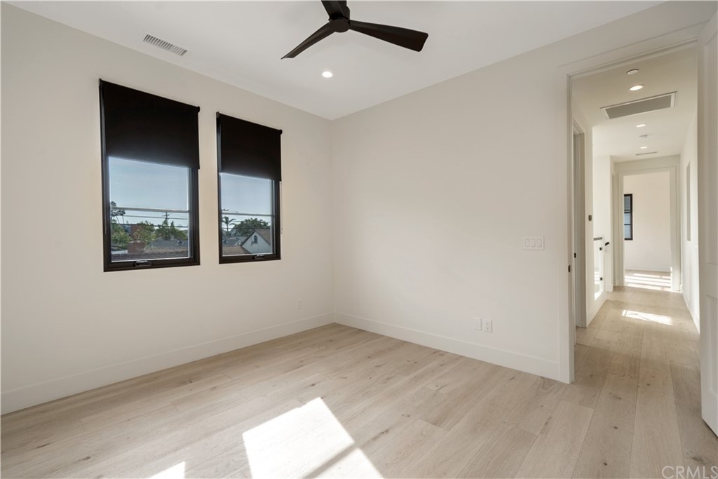 163 Broadway Costa Mesa, CA 92627 - Photo 48 of 56 This shows the upstairs bedroom empty.