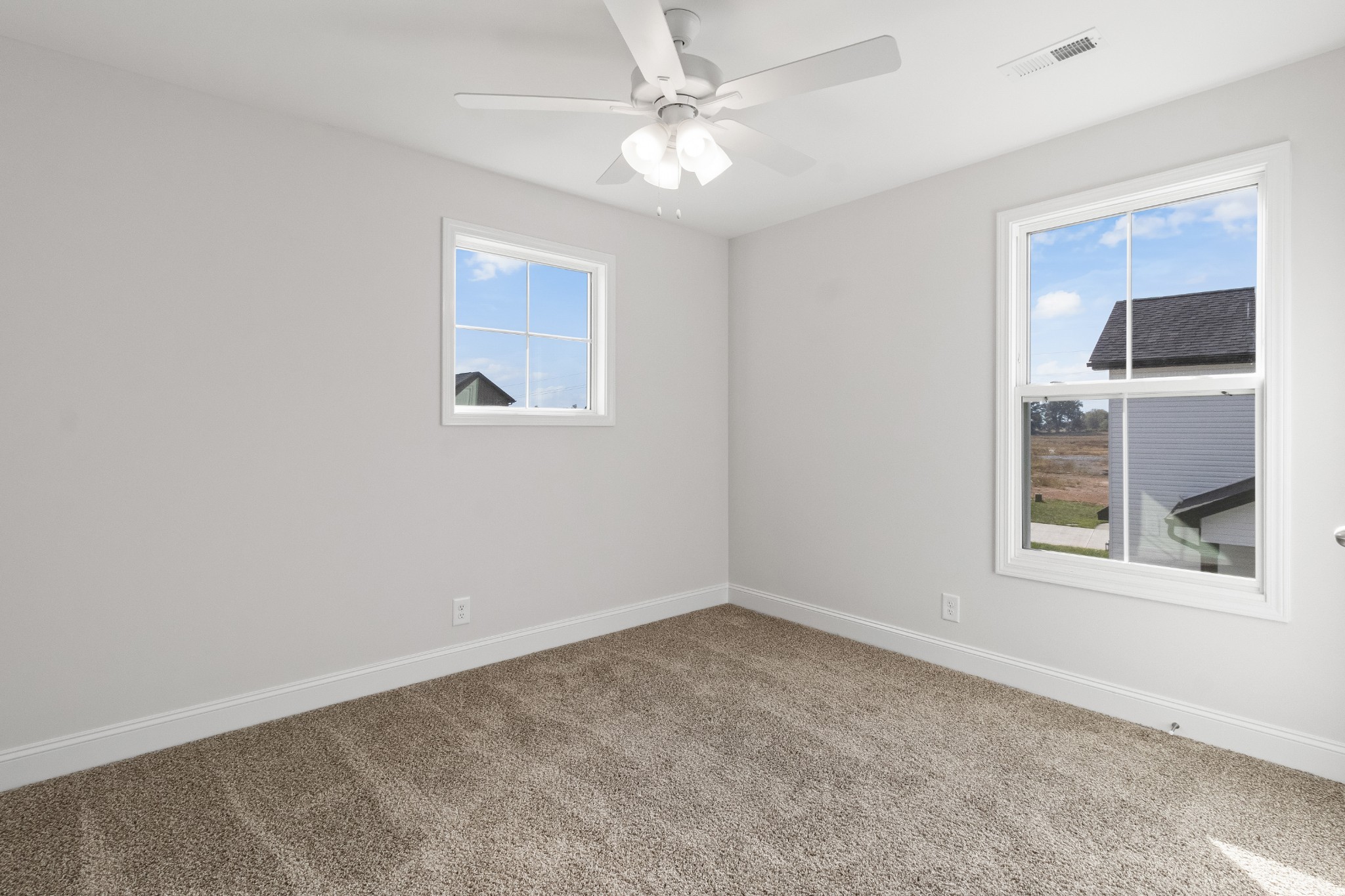 2616 Rafiki Drive Clarksville, TN 37042 - Photo 23 of 36 an empty room with a window and a fan