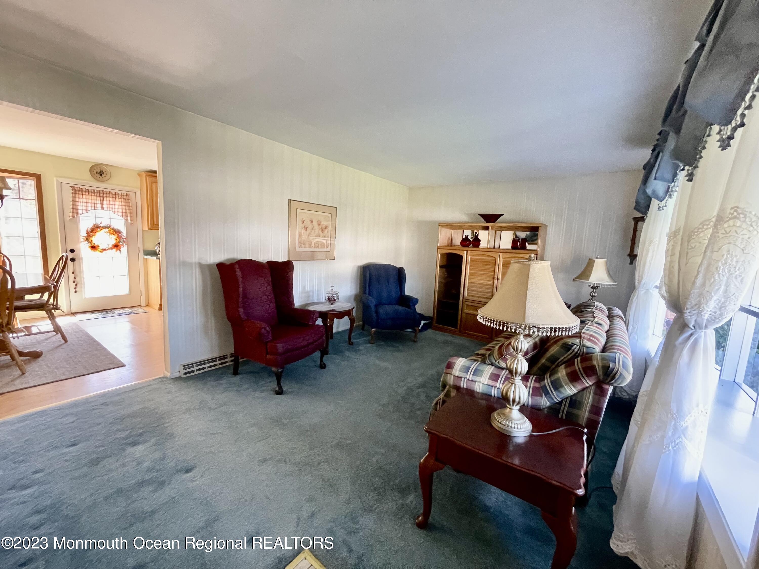 22 Saranac Road Hamilton, NJ 08619 - Photo 3 of 33 a living room with furniture and a couch