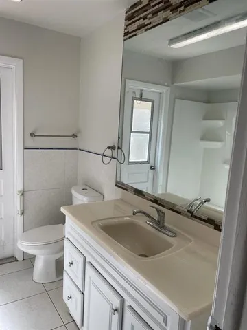 a bathroom with a sink and a toilet