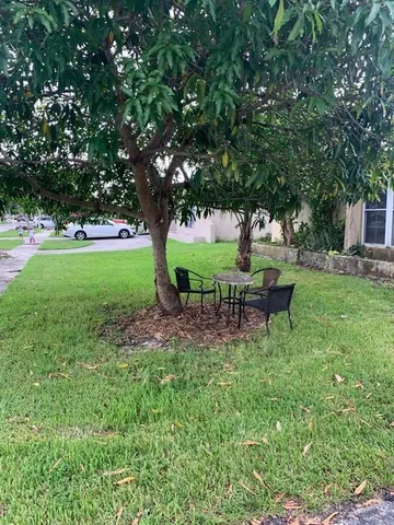 a garden view with a seating space