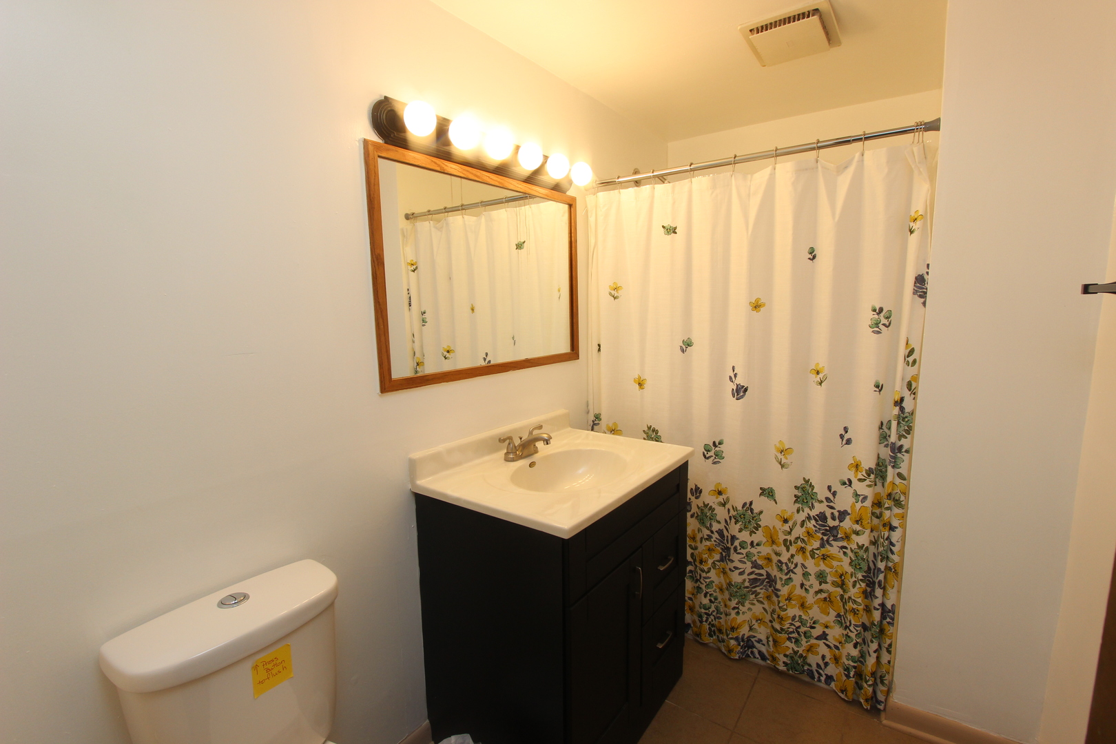 503 Plum Street Lake In The Hills, IL 60156 - Photo 15 of 20 a bathroom with a sink toilet and vanity
