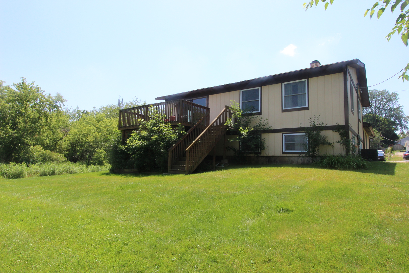 503 Plum Street Lake In The Hills, IL 60156 - Photo 18 of 20 a house view with a outdoor space
