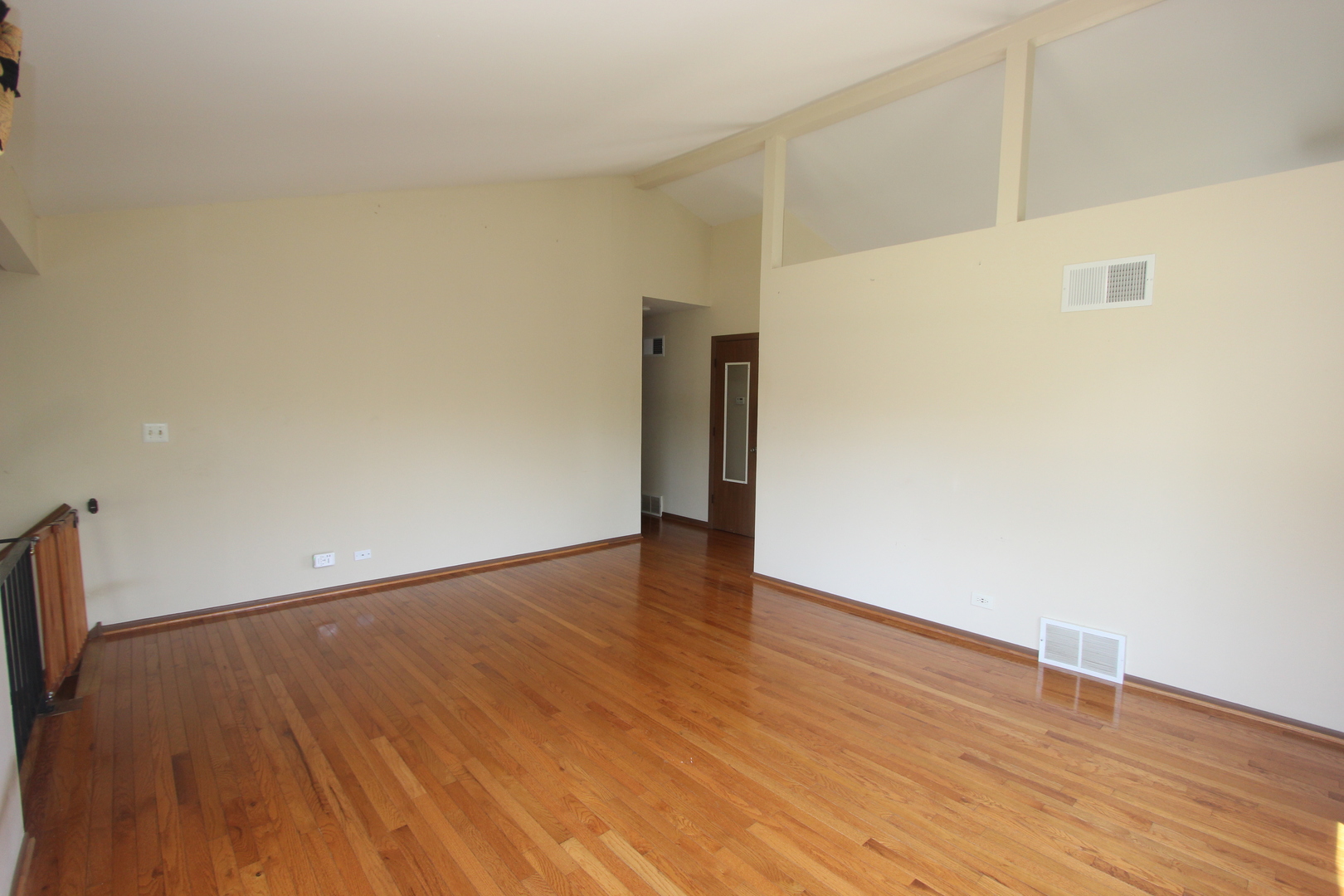 503 Plum Street Lake In The Hills, IL 60156 - Photo 5 of 20 a view of an empty room with wooden floor and closet